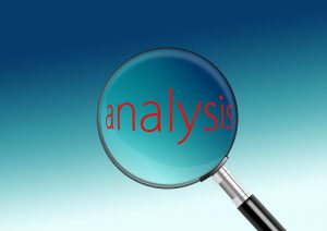 Analysis text under a magnifying glass