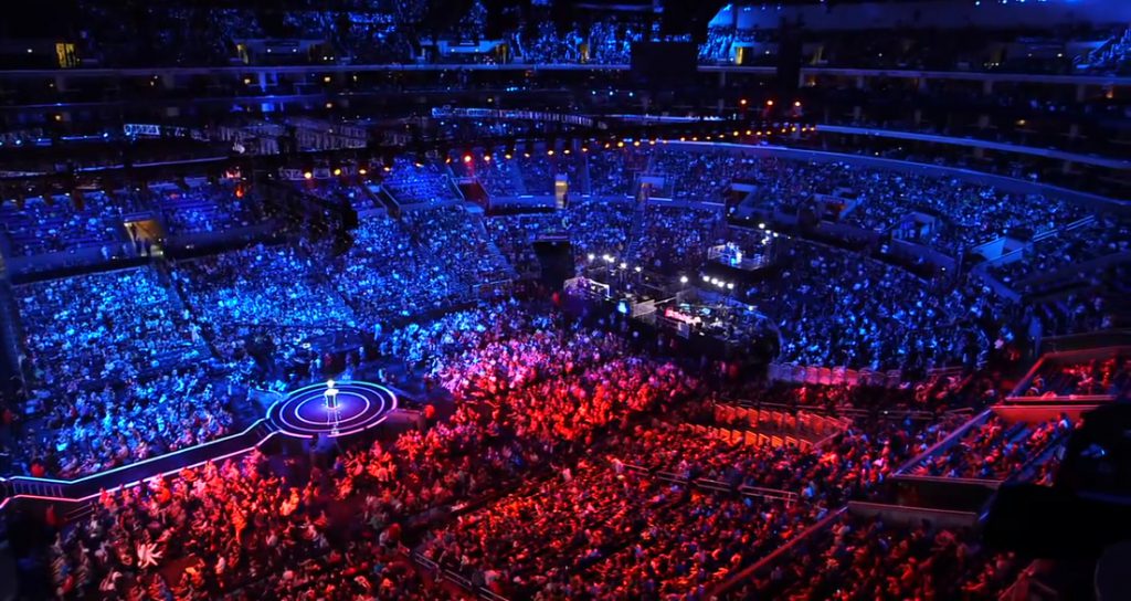 Photo of the League of Legends world championships at the Staples Center. Large crowd in a stadium.
