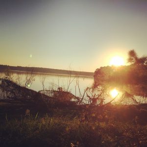Sunrise over a calm lake