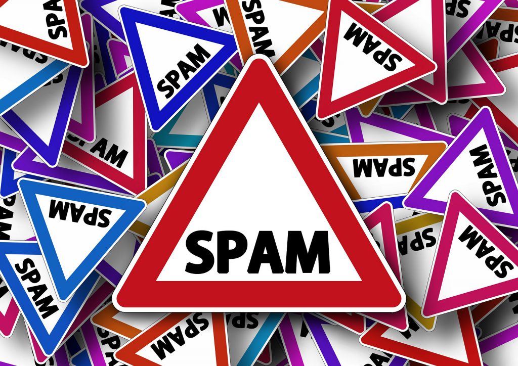 Multiple warning signs stating SPAM