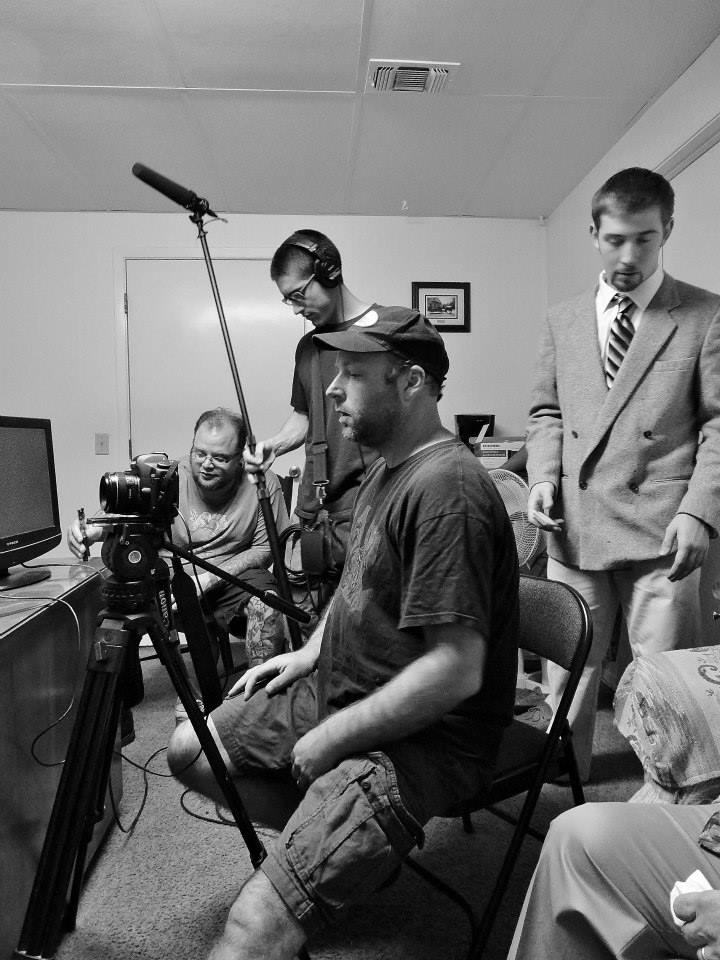 The camera and sound crew behind the camera on the set of Sacrament