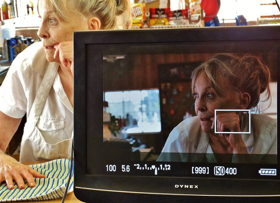 Marilyn Burns on the set of Sacrament and on a monitor