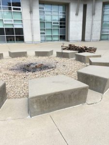 Concrete benches around a fire pit